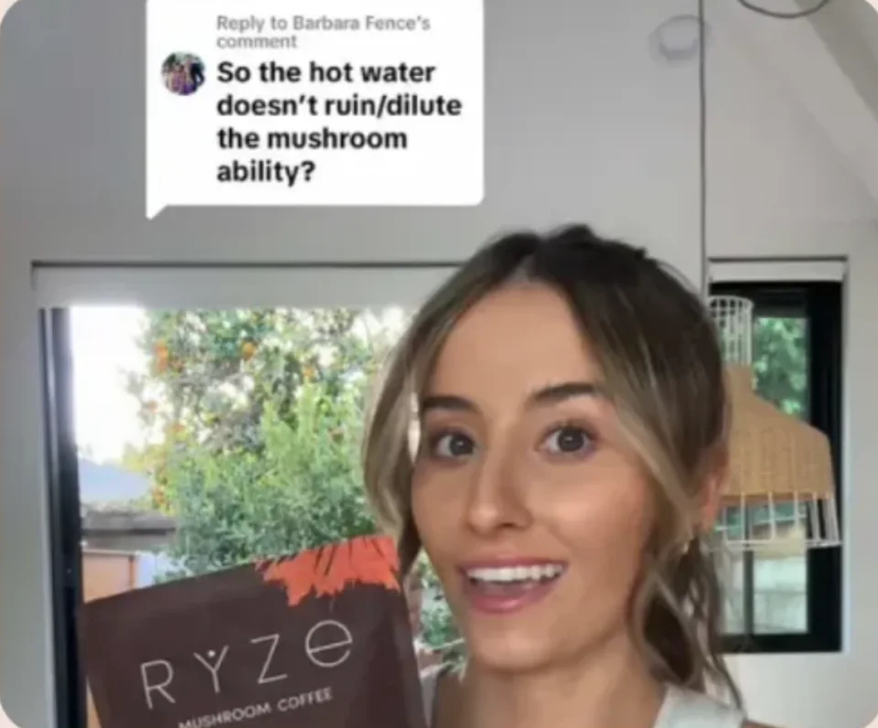 Creator answering a question about RYZE mushroom coffee on camera