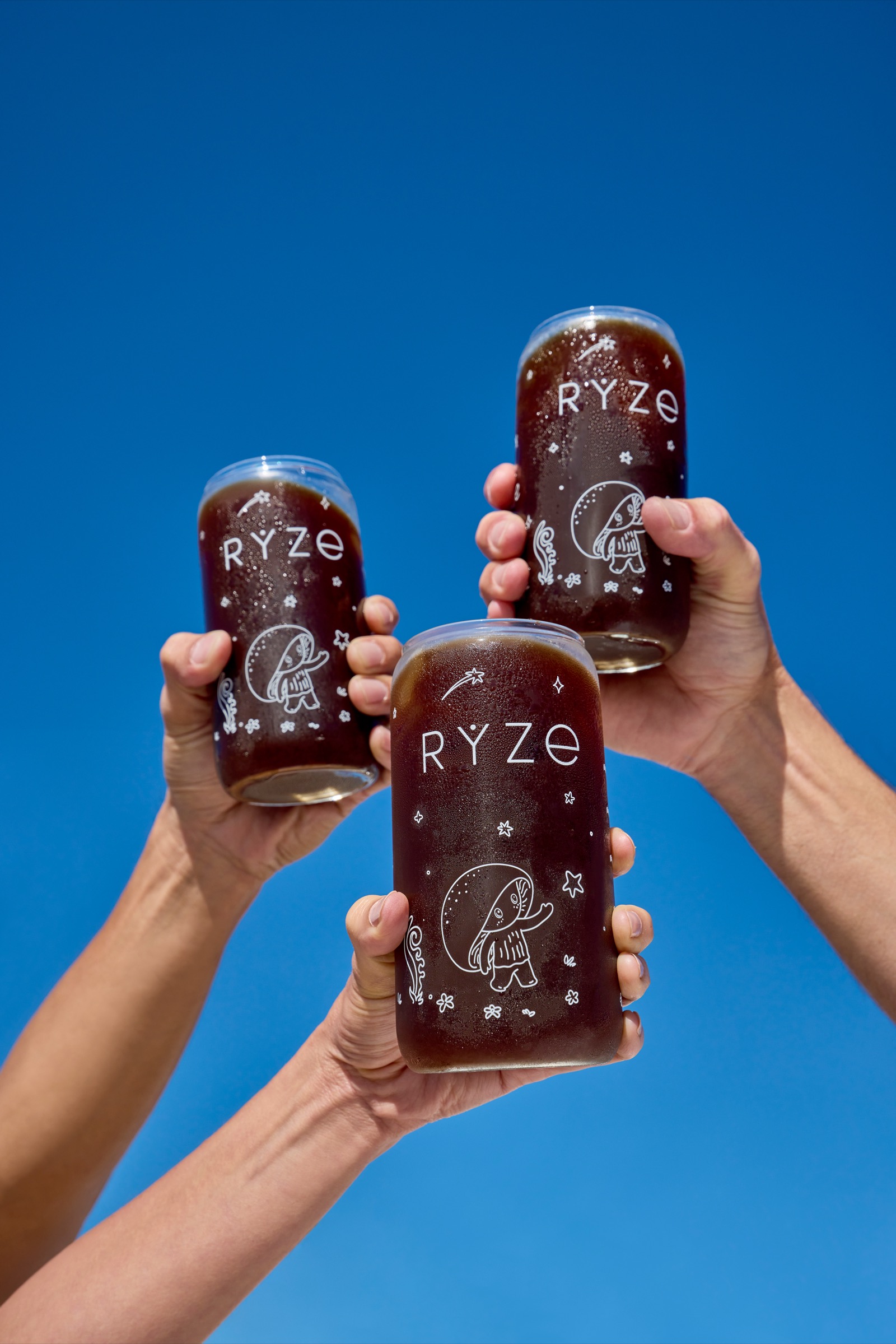 Adam sipping his RYZE coffee