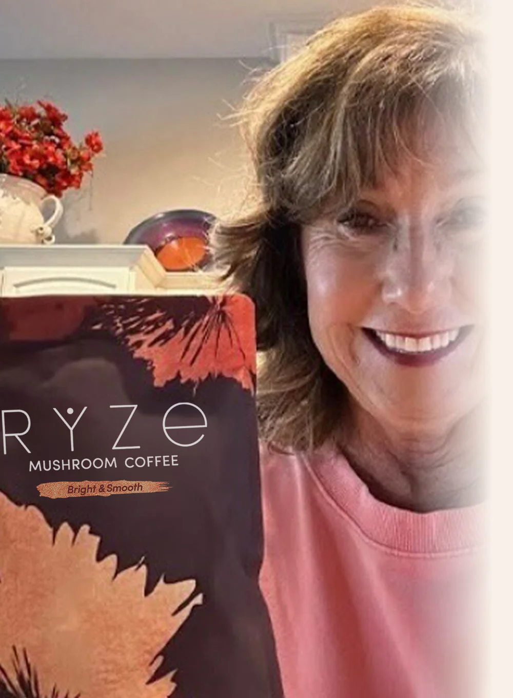 Brenda holding a mug of RYZE