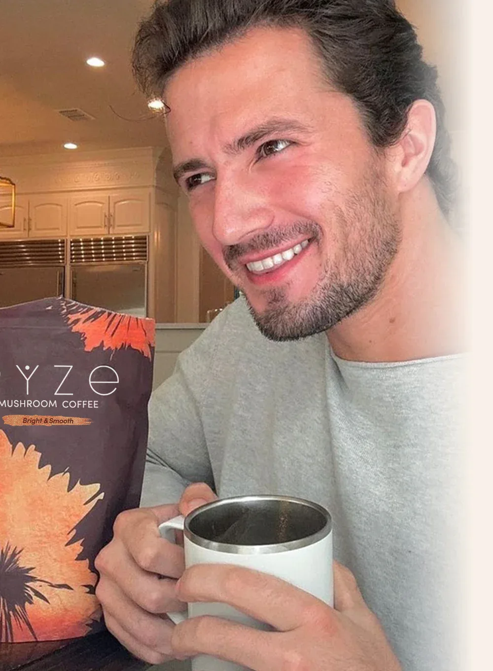 Adam sipping his RYZE coffee
