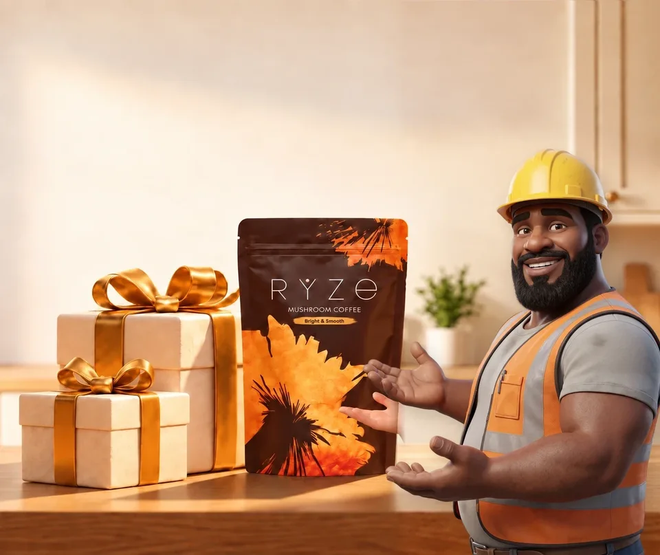 UP TO 40% OFF + FREE GIFTS. RYZE coffee and two wrapped gifts on a kitchen counter with the construction worker presenting them in the foreground.