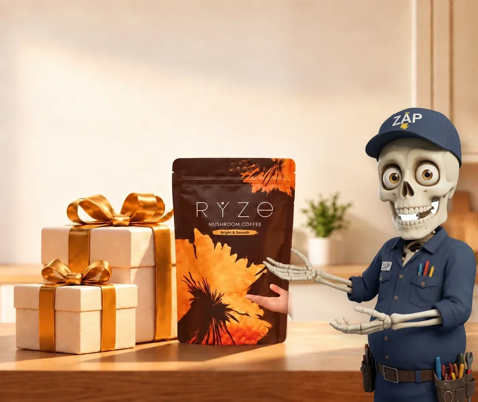 UP TO 40% OFF + FREE GIFTS. RYZE coffee and two wrapped gifts on a kitchen counter with the skeleton electrician presenting them in the foreground.